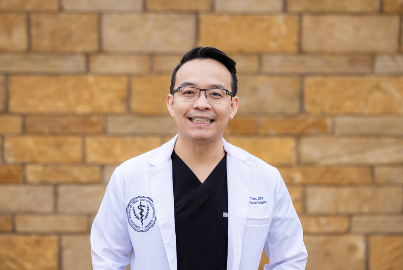 Image of Dr. Khoa Tran, DDS in front of Abilene Surgical Associates building